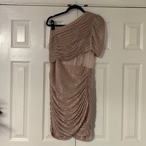 Woman’s BCBG rose gold dress